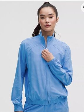 lululemon athletica Adapted State Perforated Track Jacket color is Pool Party